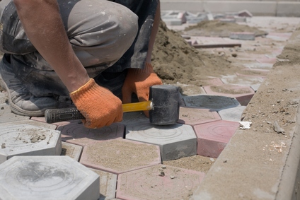Installing paving stones on concrete